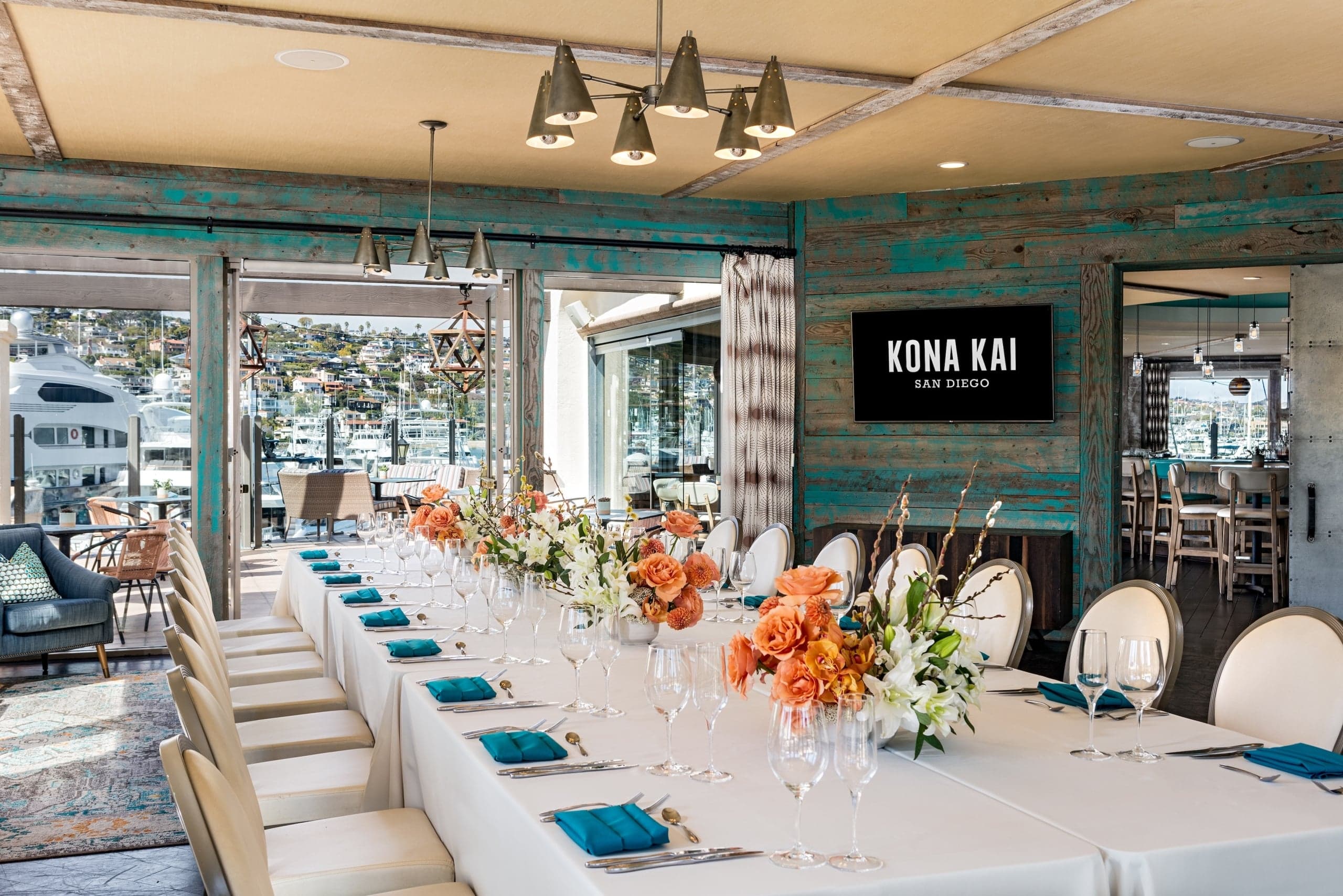 The Vessel private dining room at Kona Kai resort, set up with a long banquet table