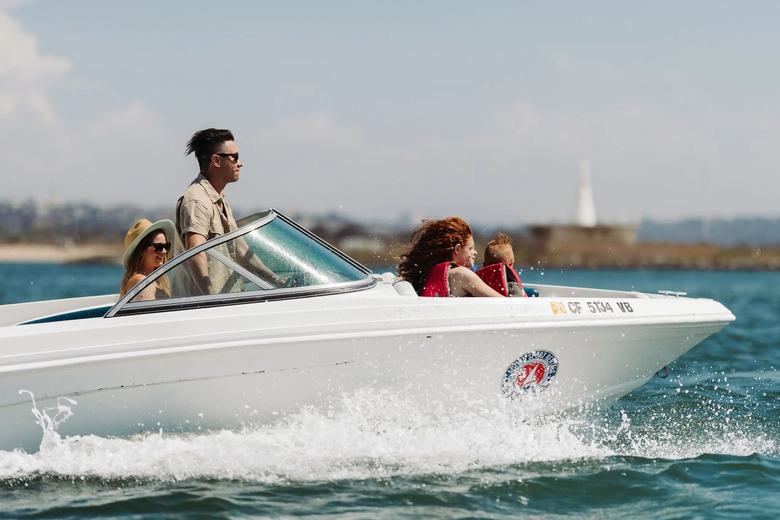 A family in a speed boat